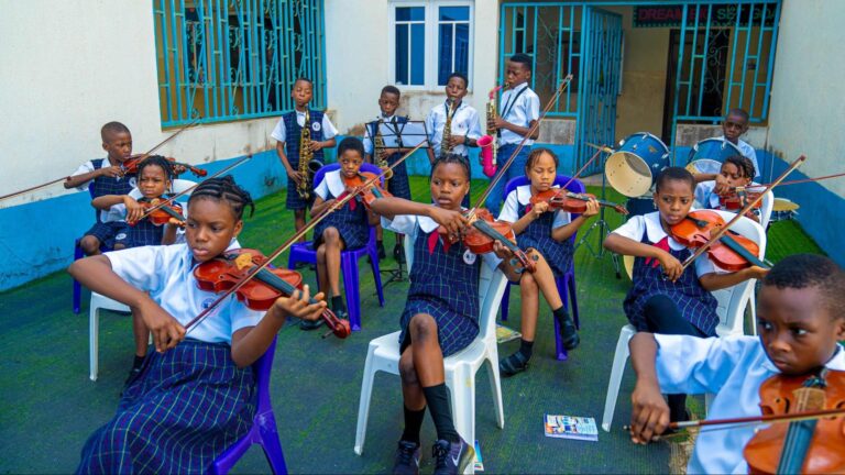 Students at ICAST School, Ibadan practicing the violin