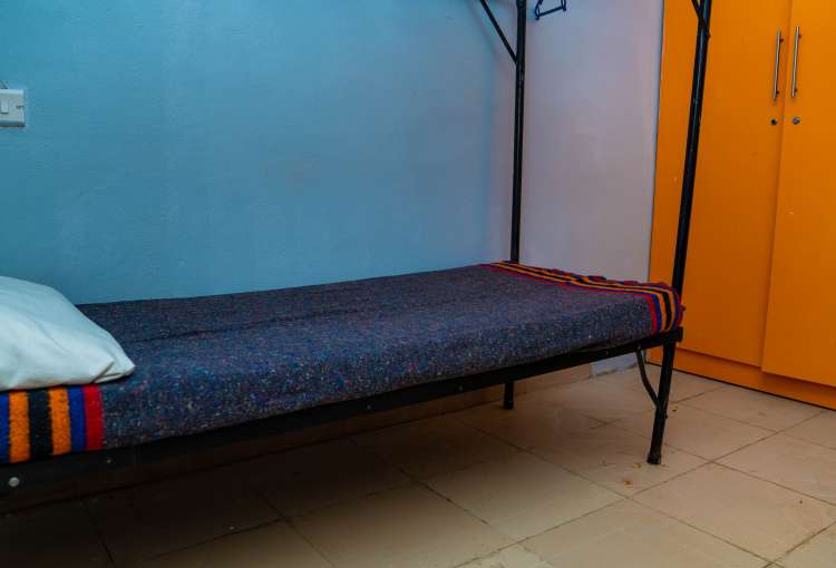 Picture showing a bed in our boarding facilities